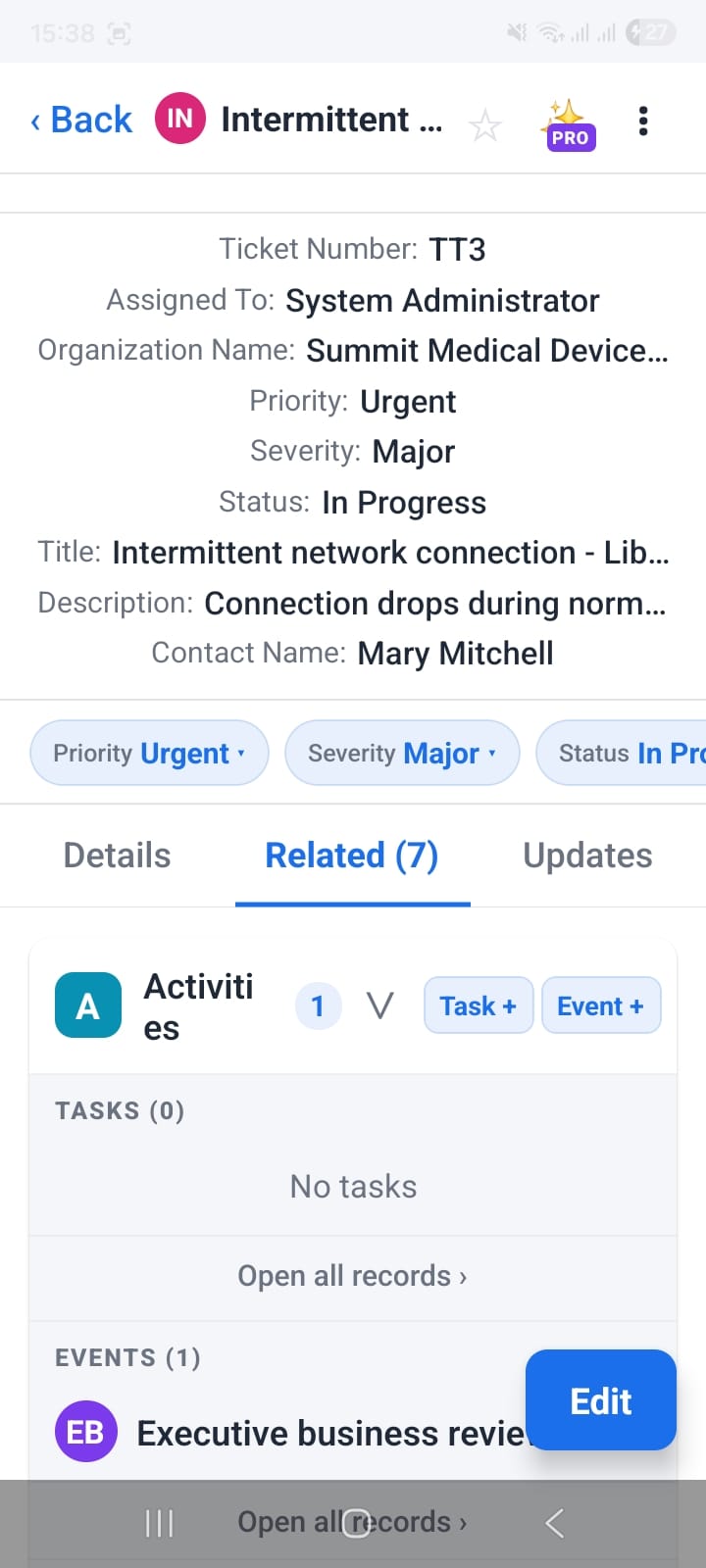 OpenCRMApp ticket Updates tab showing timestamped change history with before and after field values, and the Related Activities tab